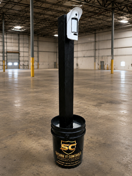 Portable Secure It Controls motion detectors on posts guarding a vacant warehouse