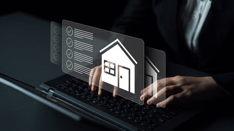 Property manager reviewing a resident mobile access system dashboard in an apartment leasing office