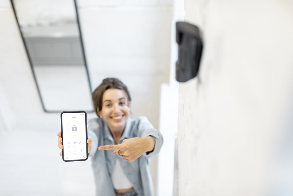 Ajax alarm system hub and mobile app used to replace an old wired burglar alarm in a Northern Colorado home.