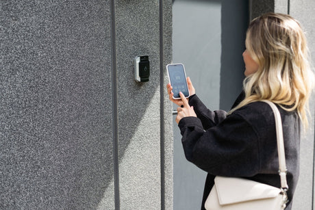 Secure It Controls technician installing Entegrity Smart smartphone access control system for keyless entry in Fort Collins Colorado
