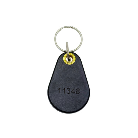 Close-up of Kantech ioProx XSF 26-bit proximity key fob — teardrop-shaped 125 kHz RFID credential compatible with Kantech readers and access control systems.